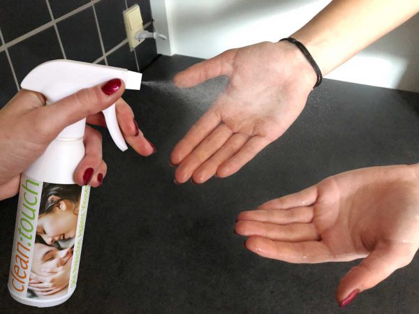 Sanitizing hands with clean:touch